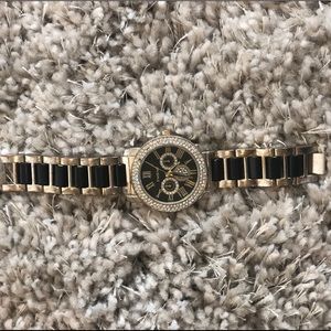 Bebe black and gold watch
